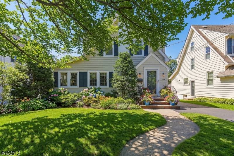 Beautifully situated near the Midtown Direct train and downtown Millburn, this charming 3 bedroom colonial home offers exceptional comfort, character, and convenience on a professionally landscaped lot.