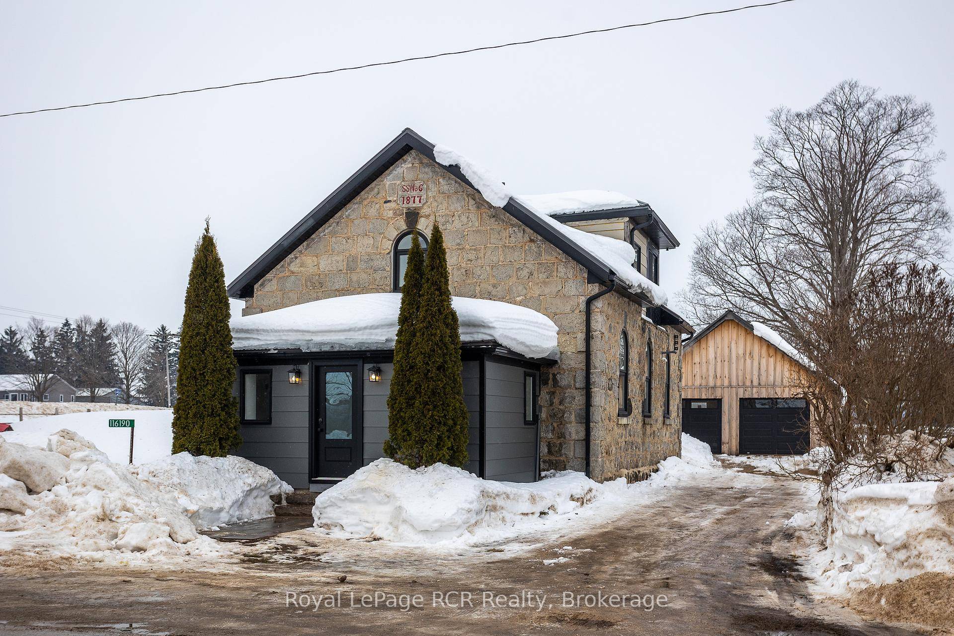 1877 converted Schoolhouse with detached double garage.