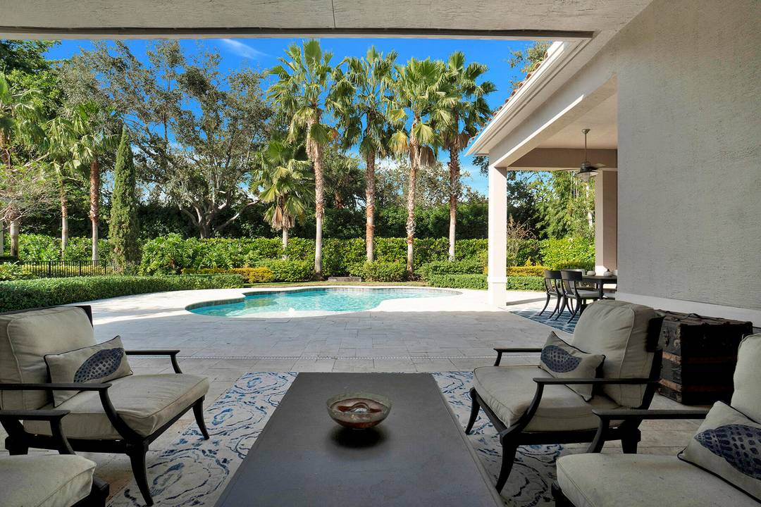 Perfectly situated behind the manned gates of the exclusive Palm Beach Polo Club, this exquisite property awaits you !