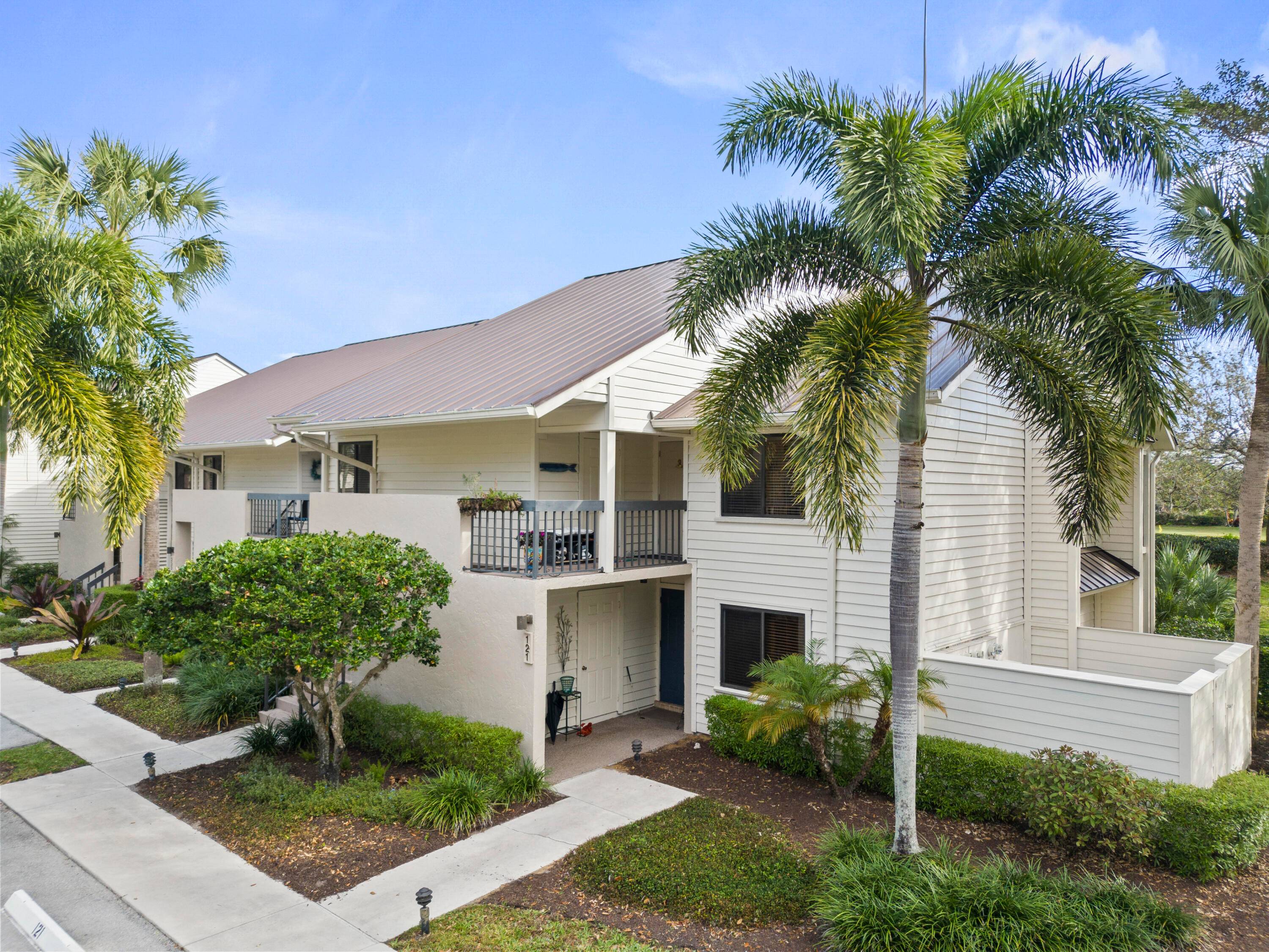 Nestled within the Fairway Apartments of Mariner Sands, this renovated corner unit boasts two bedrooms, two bathrooms and a new A C Unit and Hot Water Heater.