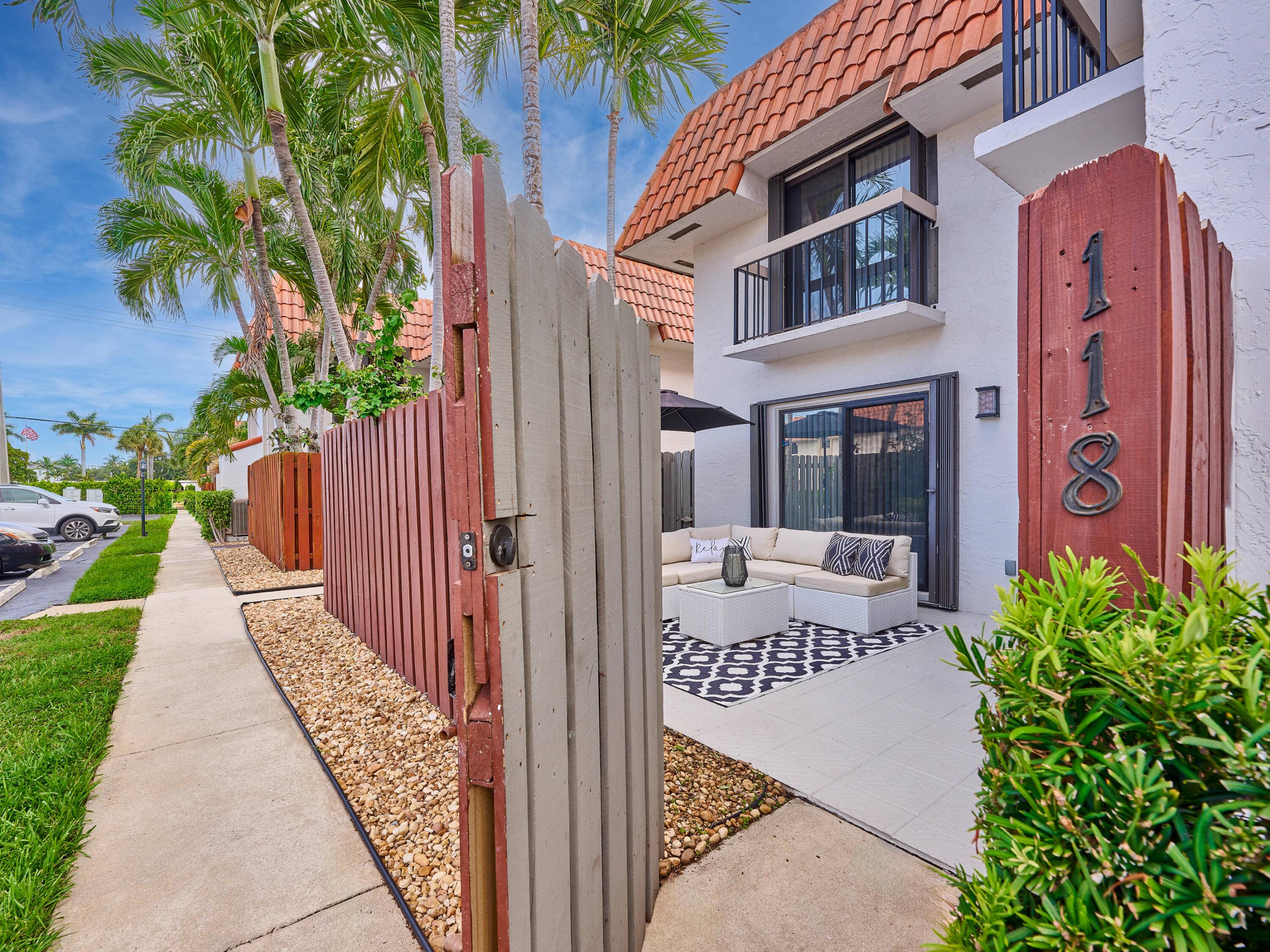 Discover the epitome of luxury living in East Boca Raton with this stunning modern townhouse featuring 2 spacious master ensuite bedrooms and 2.