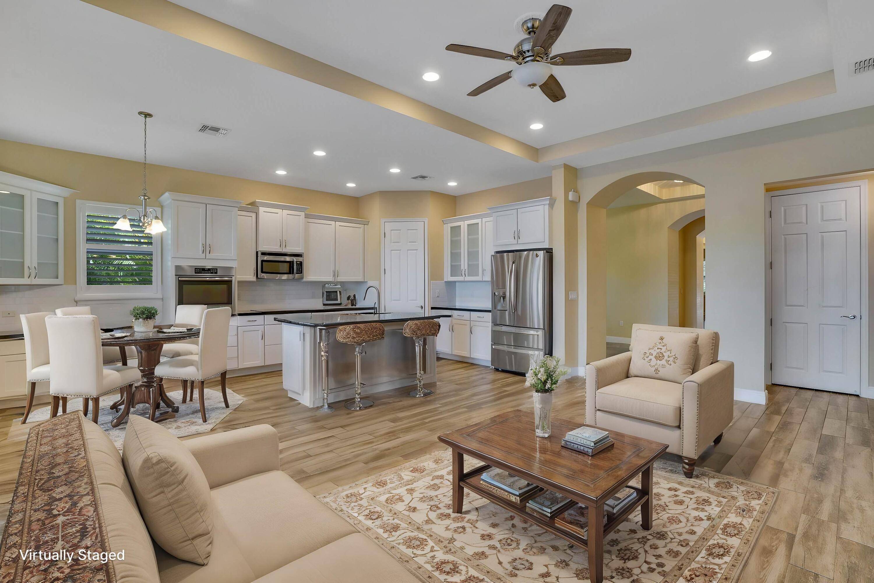 Stunning Portosol lakefront home has 3 bedrooms Den, 2 1 2 ba, an elegant dining room, and a wonderful great room with attached gourmet kitchen.