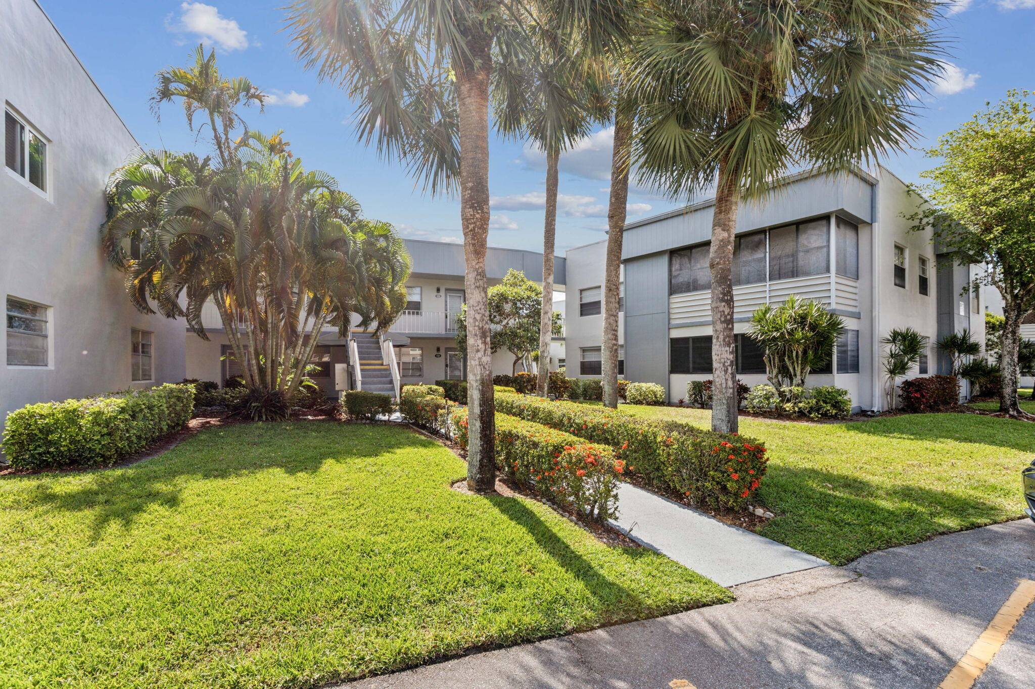 Embrace serenity and sophistication in this exquisite 2 bedroom, 2 bathroom condo nestled within the prestigious Kings Point community of Delray Beach.