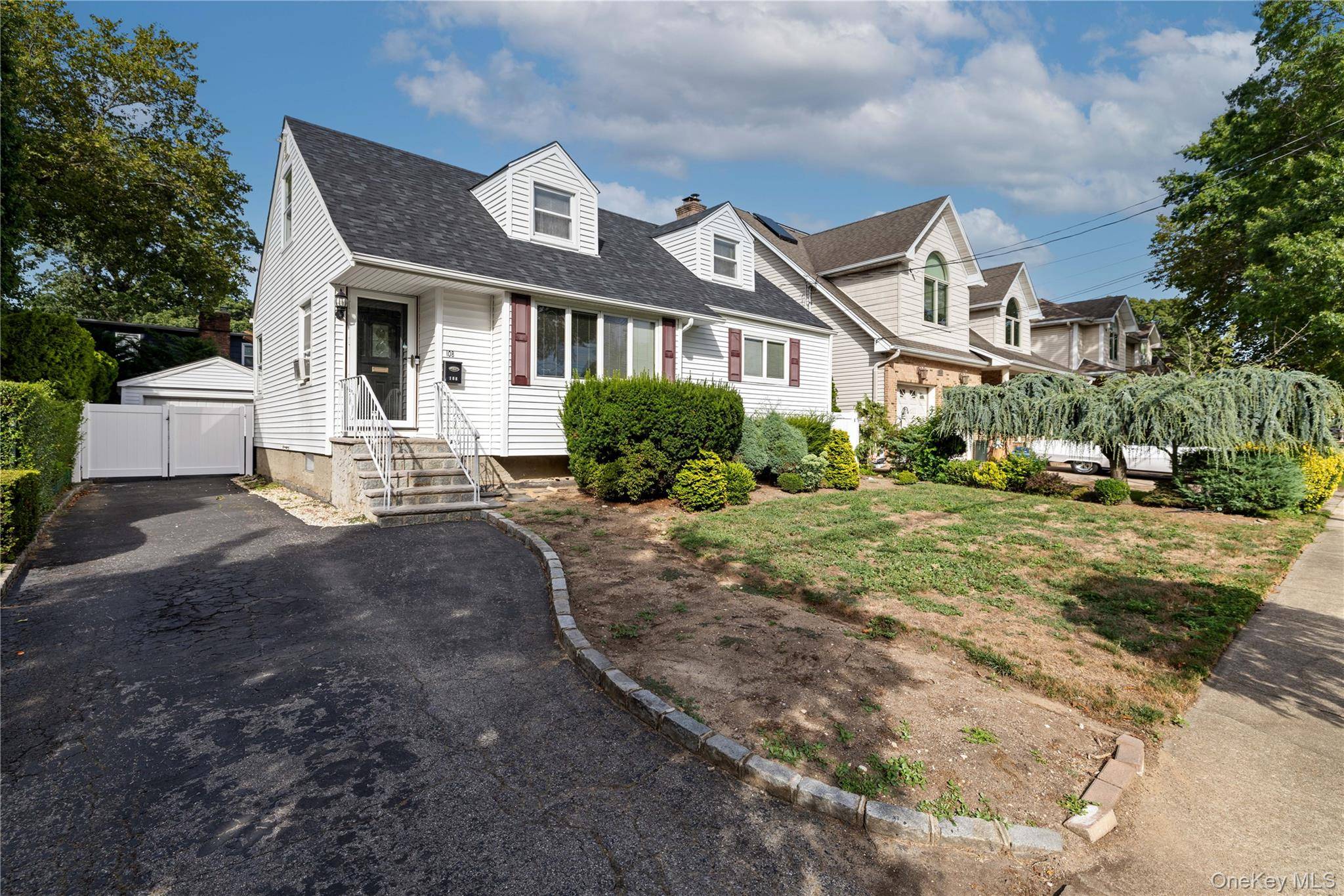 Welcome to this mid block, cozy cape style home in the heart of Malverne Village.