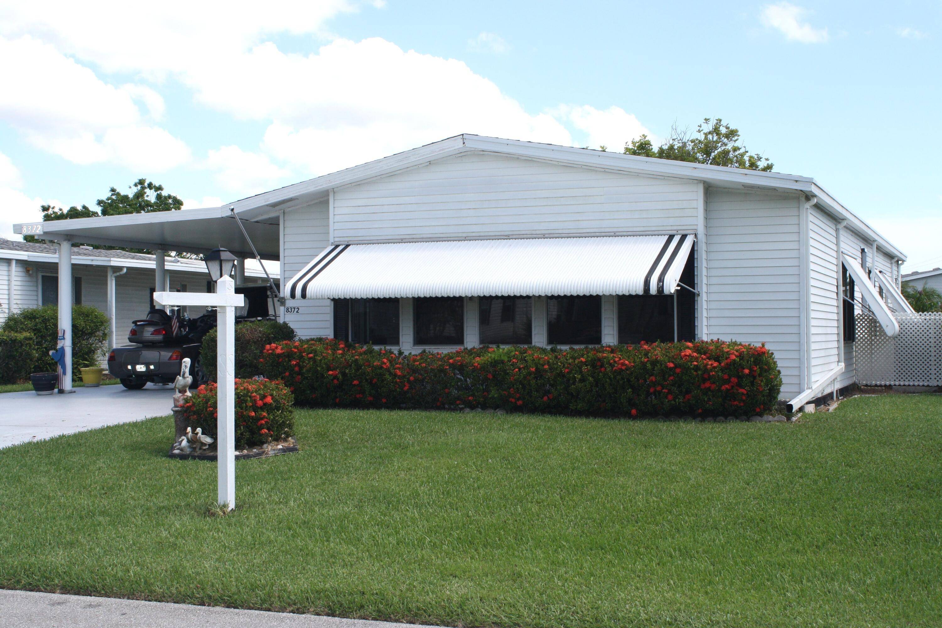 LAND OWNED Spacious Open Floor Plan, this 2 2 has large island kitchen, and many updates which includes AC 2023, New AC Duct work under the home, 2024 vapor barrier, ...