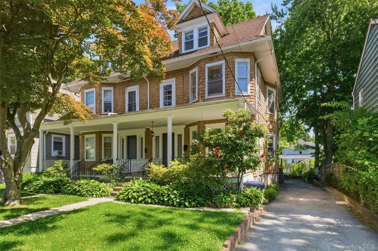Nestled in the heart of White Plains, this timeless Colonial Revival blends historic charm with everyday functionality.