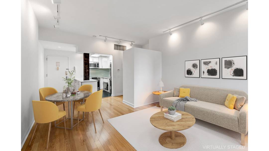 Residence 8B is a loft like one bedroom condominium with both South and Eastern exposures in landmarked 56 Pine Street.