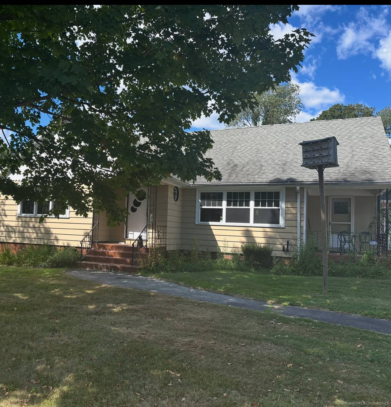 Spacious Cape Style Home with Endless Potential !