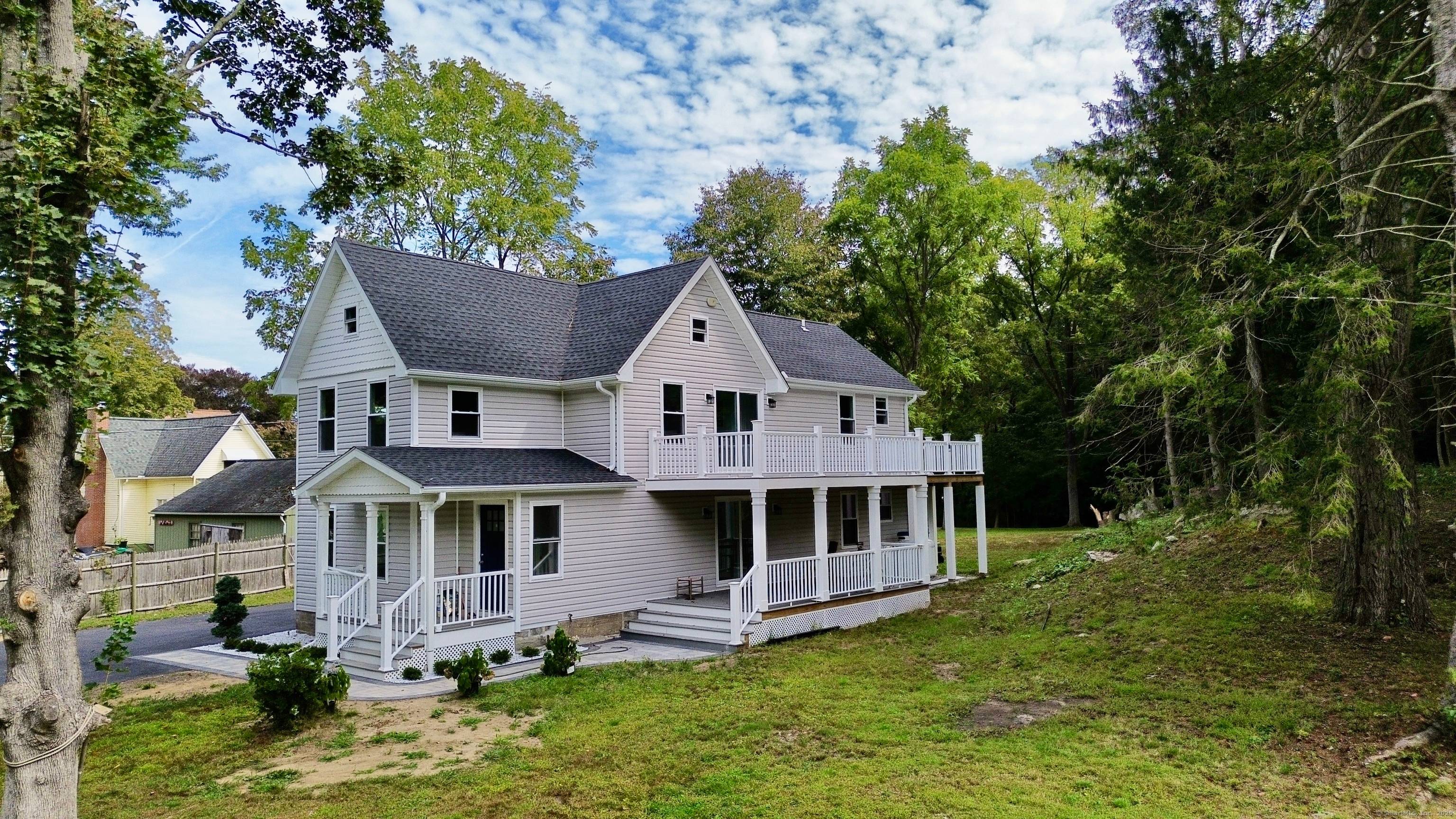 A RARE GEM, WELCOME TO THIS RESTORED VICTORIAN TWO FAMILY HOME DESIGNED FOR EASY LIVING.