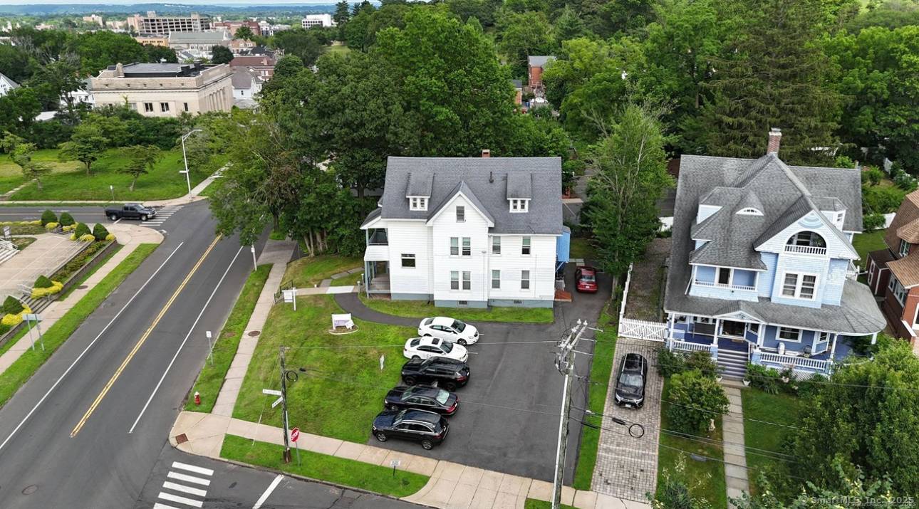 Don't miss this 4 unit mixed use property on West Main Street !