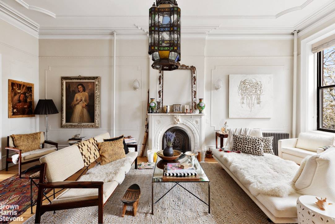 Stylishly Renovated Townhouse with Garage Tucked behind a beautifully restored facade on a quiet, tree lined block, 185 12th Street is a masterclass in thoughtful renovation and timeless design.