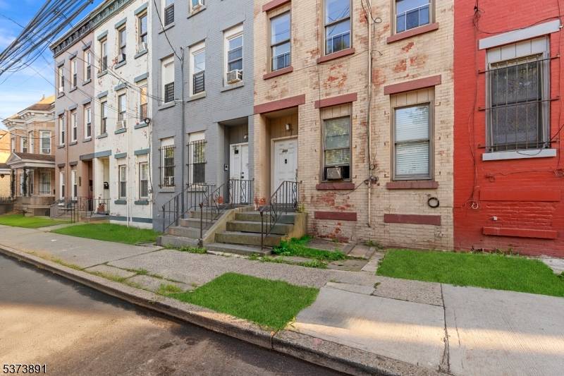 Welcome to 348 Sussex Avenue, a solid brick multi family property located in the heart of Newark.