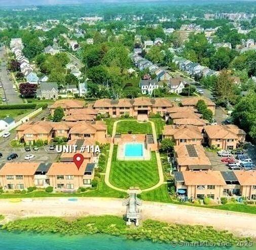 Spectacular water views from this waterfront town house right on the Long Island Sound.