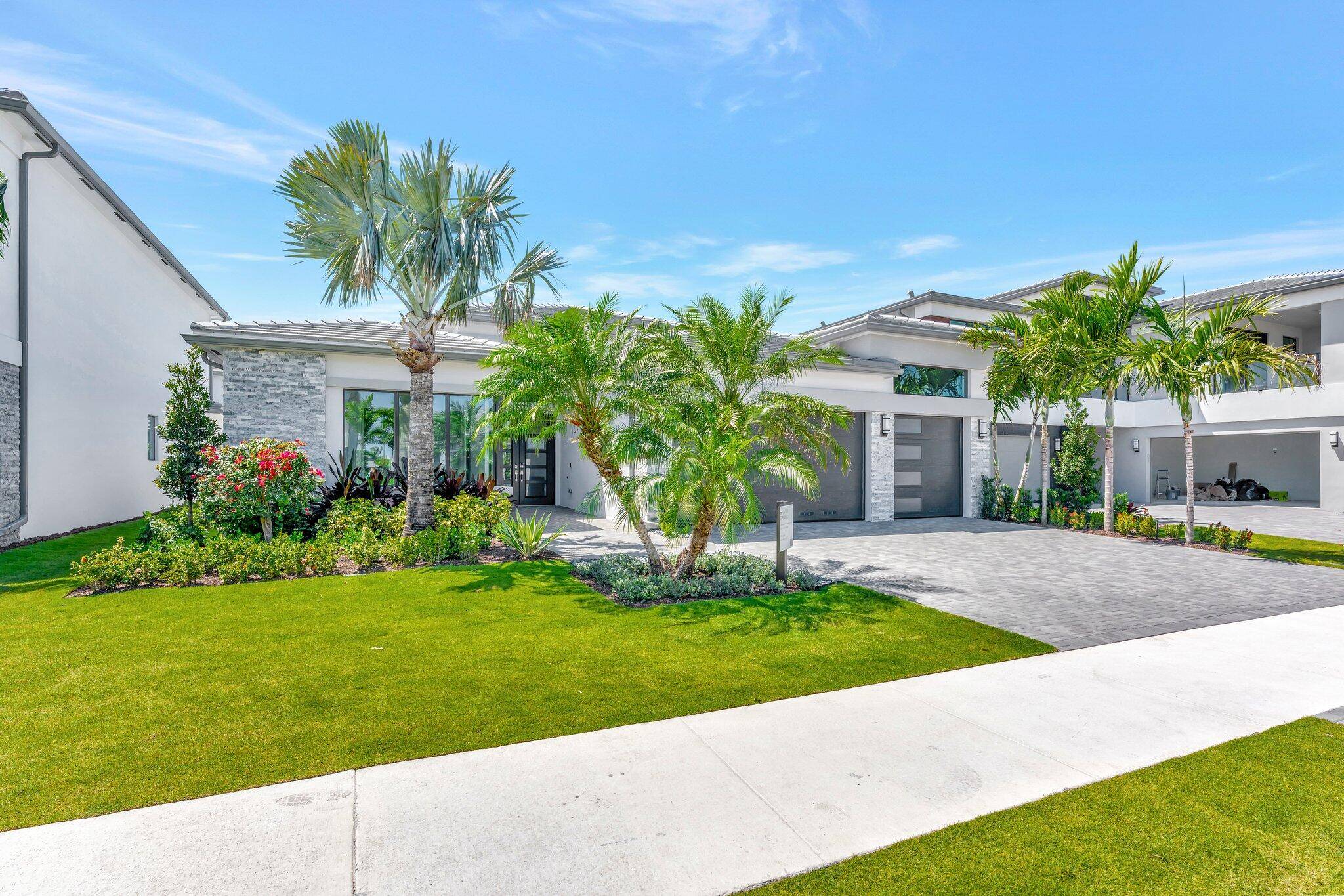 Move In Ready ! Step right into luxury with this never lived in Santo Grand Model in the prestigious Lotus Edge community.