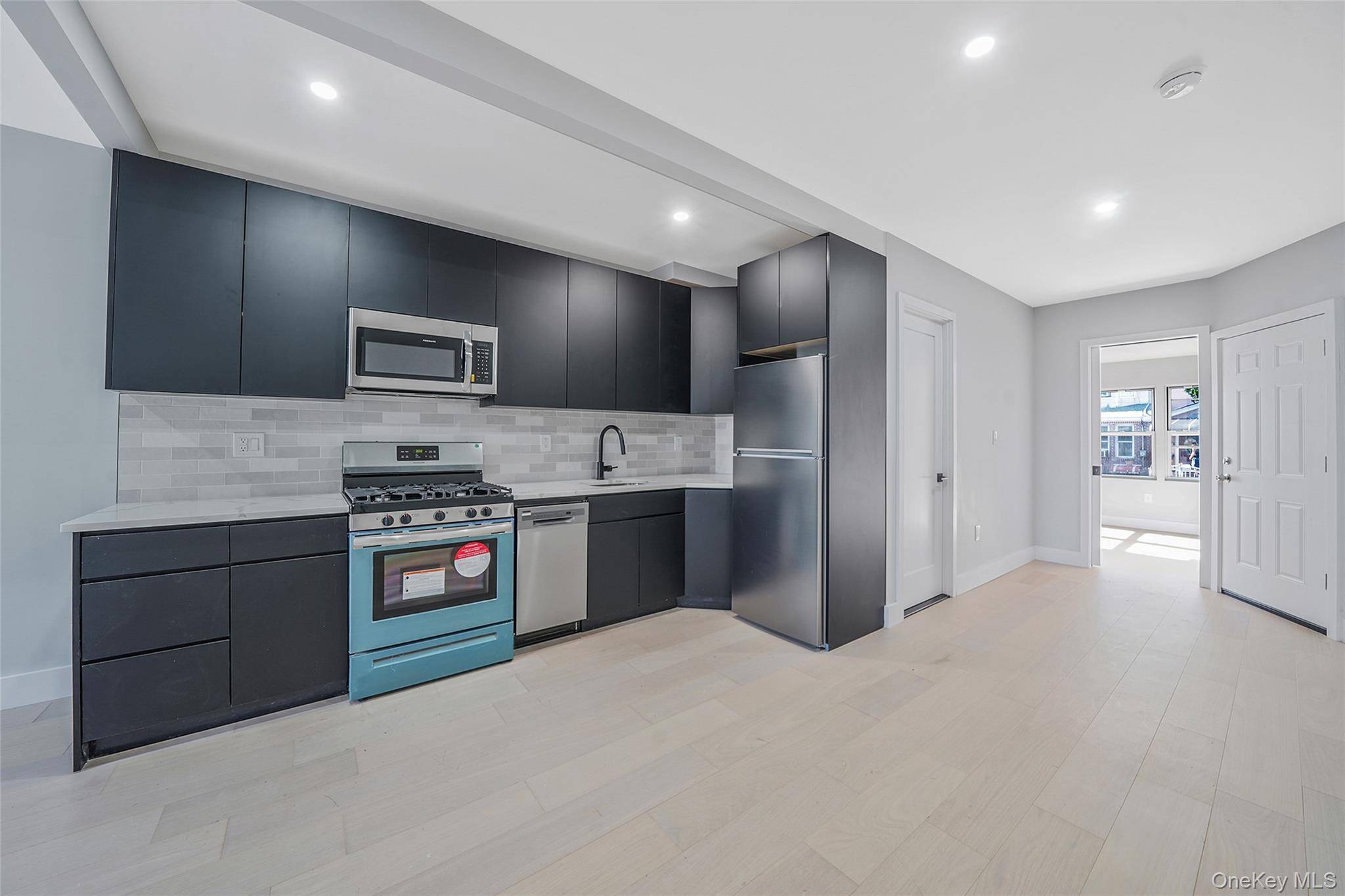 Welcome to this beautifully renovated 2 family home, thoughtfully designed for comfort, style, and convenience.