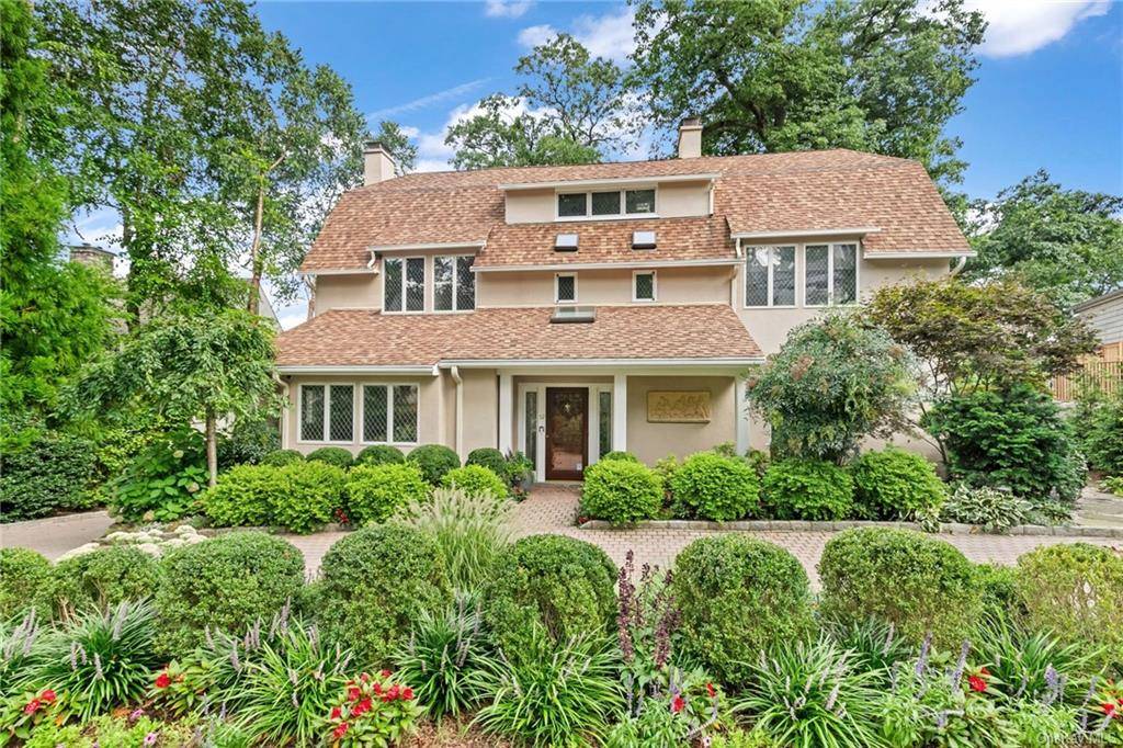 Welcome to 52 Prescott Avenue, a sanctuary of privacy nestled in the coveted Lawrence Park neighborhood of Bronxville Village.