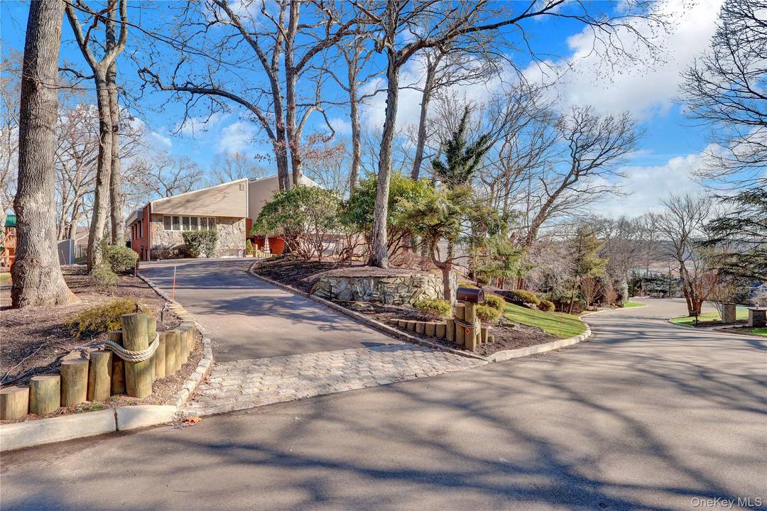 Paradise on the Nissequogue River with 65 feet of waterfront, ideal for canoeing, kayaking, and serene relaxation.