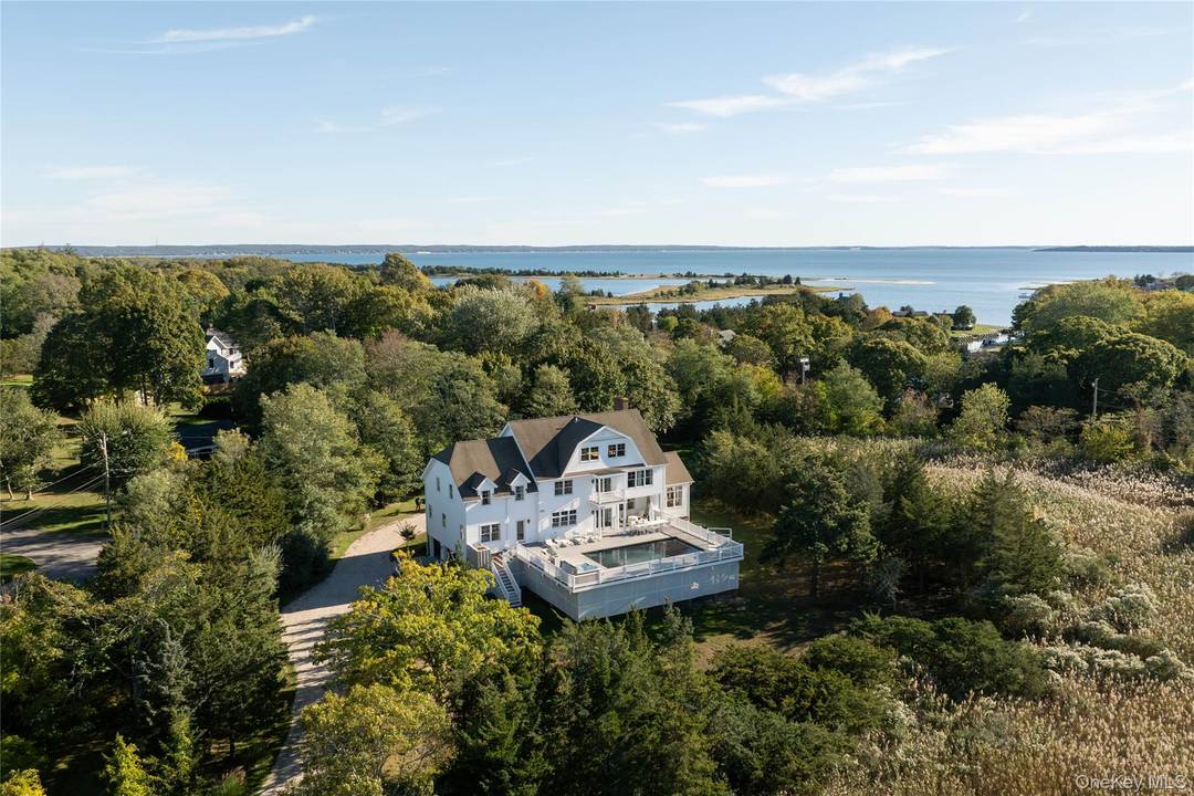 Discover a rare waterfront property where privacy, space, and breathtaking views come together on 6.
