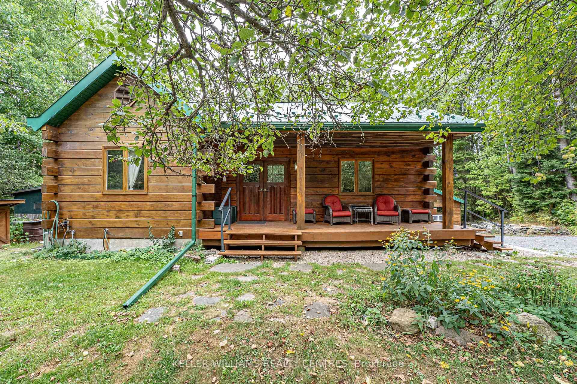 Escape to nature with this stunning 2 1 bedroom custom log home, set on 6.