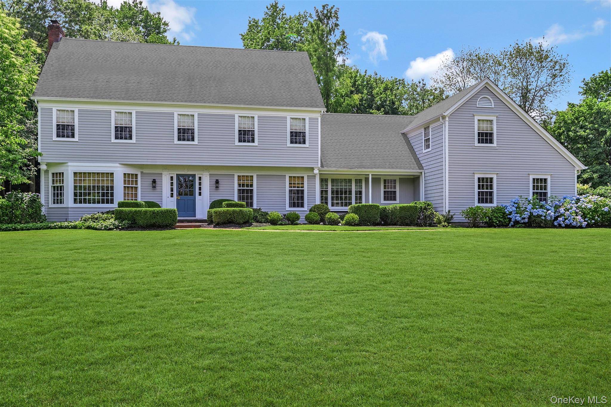 A Lloyd Harbor classic and timeless Colonial, tastefully and elegantly designed.