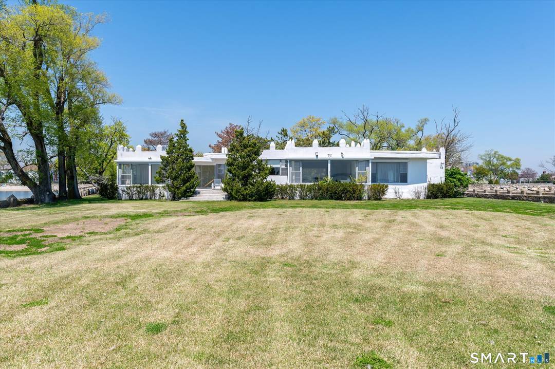 Set on 1. 68 extraordinary acres at the end of Davenport Drive, this waterfront peninsula property offers a rare chance to reimagine and transform an existing residence into a custom ...