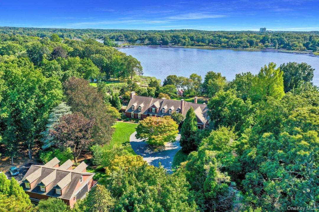Magnificent Country Waterfront Estate on shy 3 acres tucked away in Strong's Neck, Setauket.