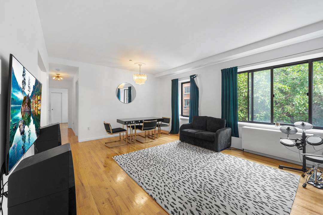 Welcome to 69 East 130th Street 2A, a stunning two bedroom, two bathroom condominium in the heart of Harlem.