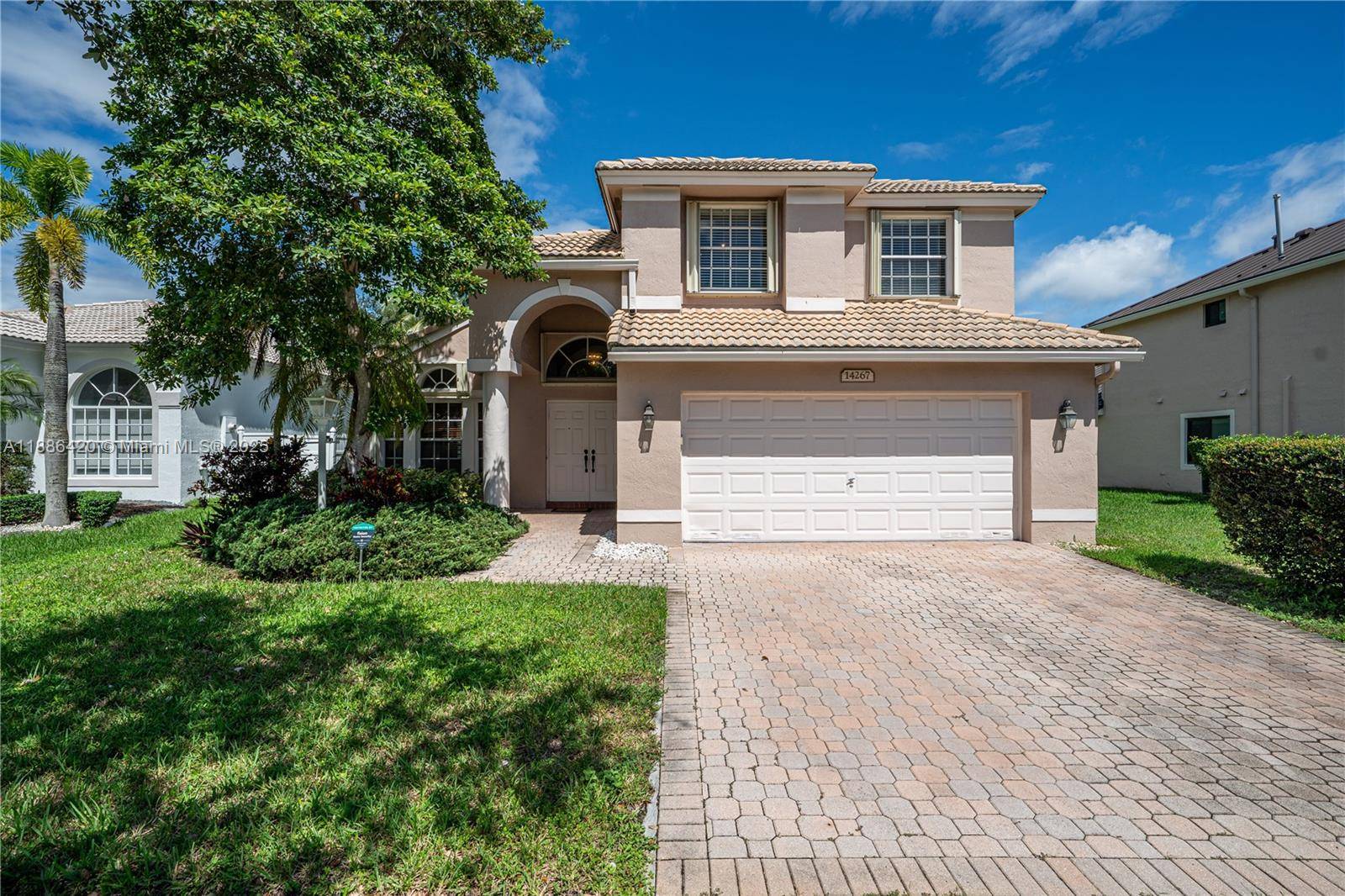 IMPPECABLE MALIBU MODEL HOME IN HIGHLY DESIRABLE PEMBROKE FALLS THIS 4 BEDROOM, 2.