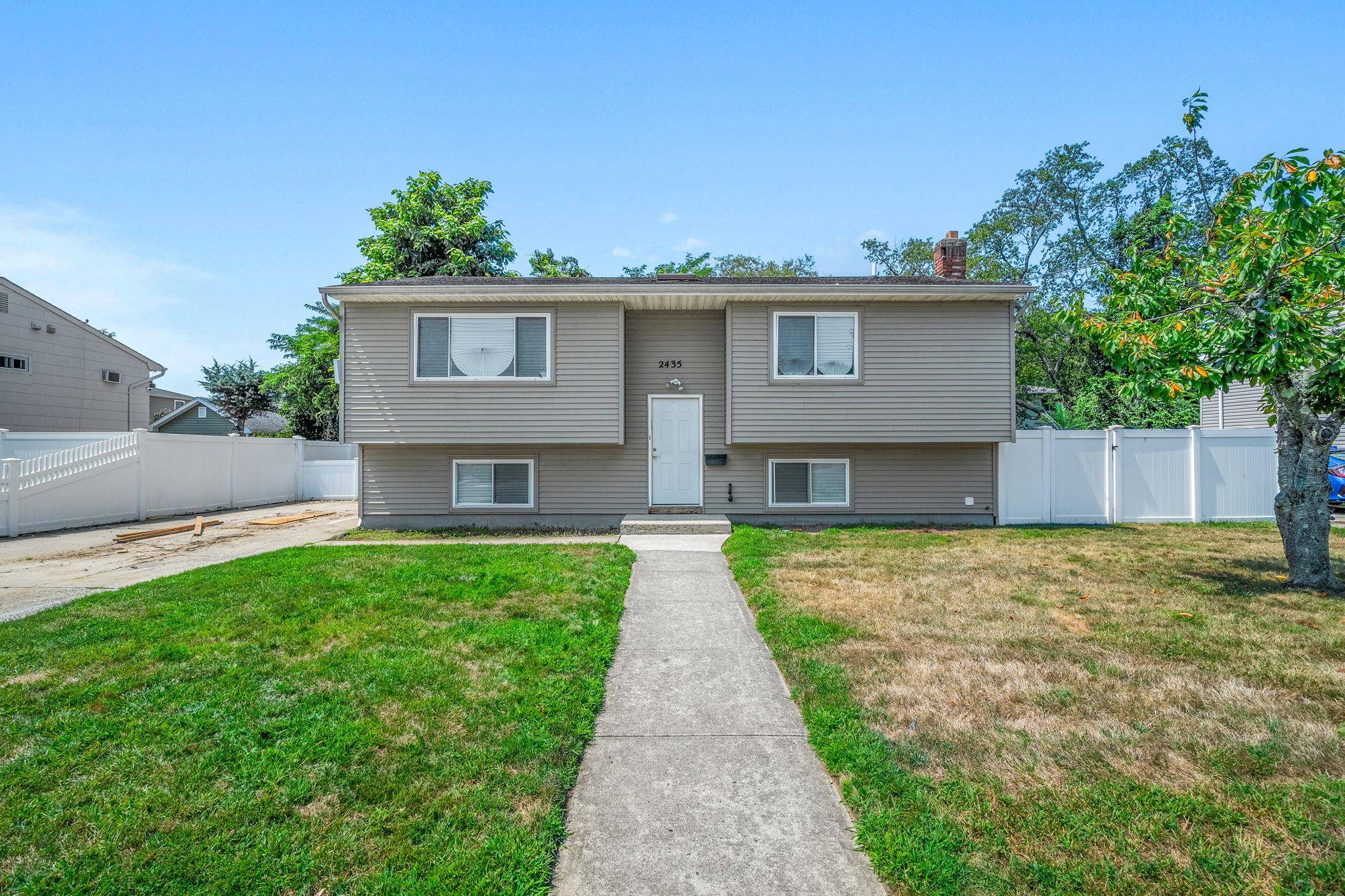 Welcome to this Spacious and Versatile Split Ranch !