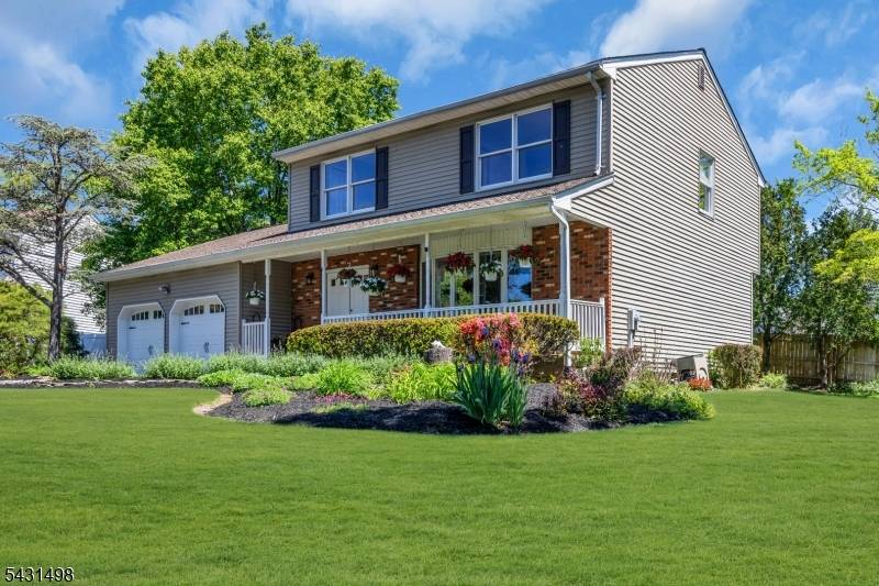 Move right into this beautifully maintained Colonial tucked away at the end of a private cul de sac in desirable Piscataway.