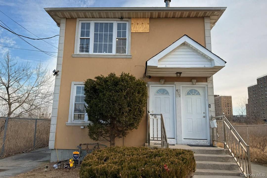 Welcome to Far Rockaway sun drenched detached 2 family home.