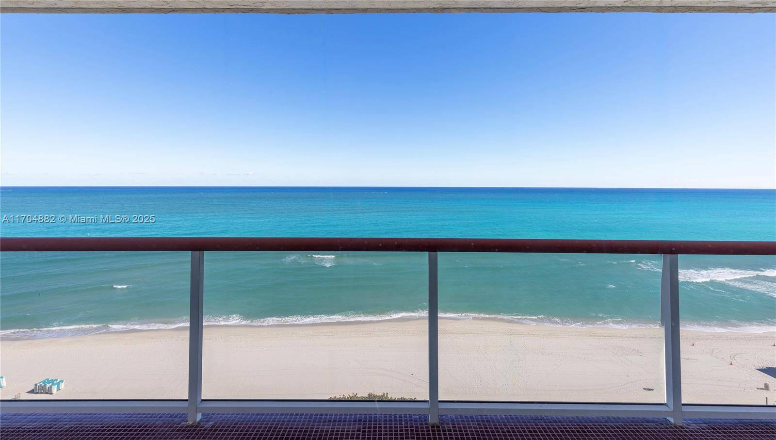 The Atlantic Ocean is your back yard in this magnificent corner unit with Direct Ocean Views !