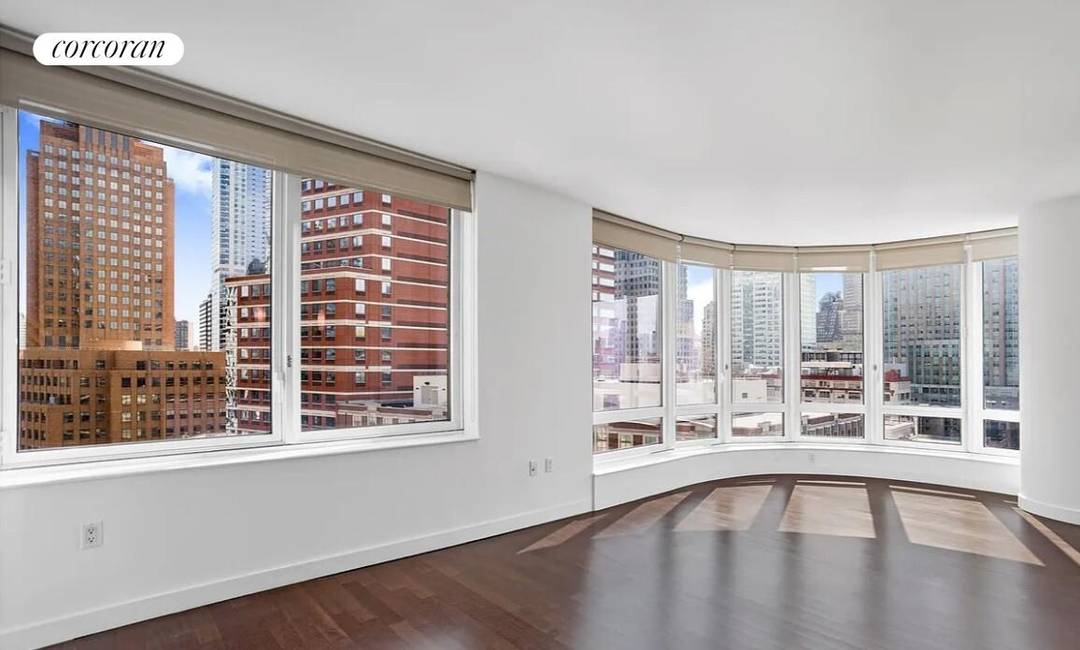 Spacious and exceptionally bright corner one bedroom, one bath condominium at The Oro Condominiums.