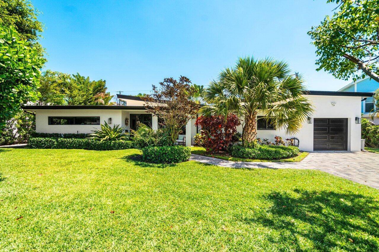 This beautifully renovated single story home blends modern comfort with timeless European flair.