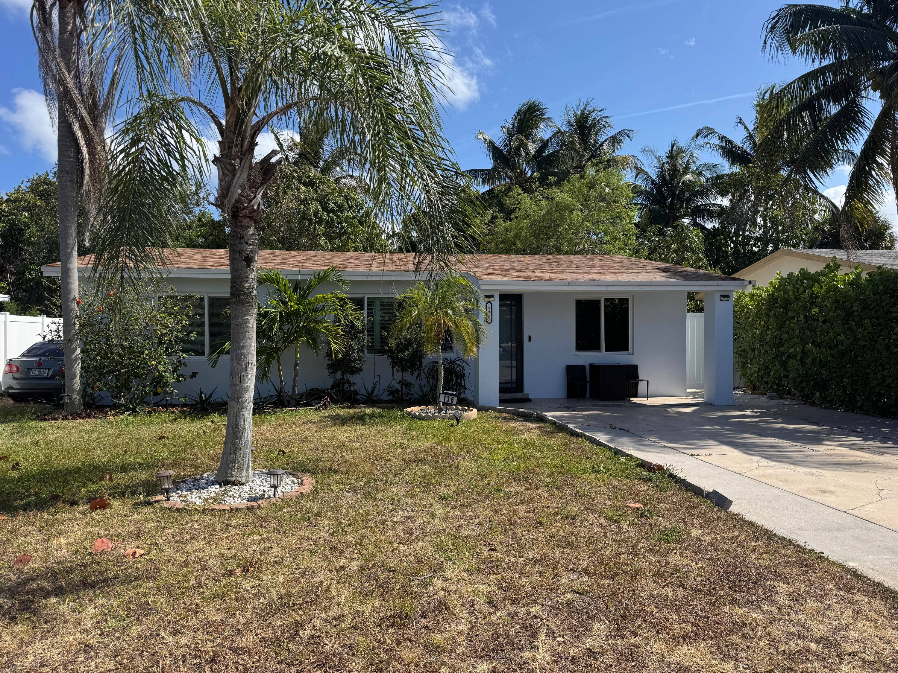 Charming 3 Bedroom, 2 Bath Single Family Home with large back and front yards, room for pool, screened patio, shed, fenced, terrazzo floors, plantation shutters, lots of parking up to ...