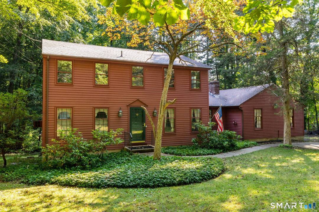 This colonial where classic charm meets modern comfort is perfectly set on a private 1.