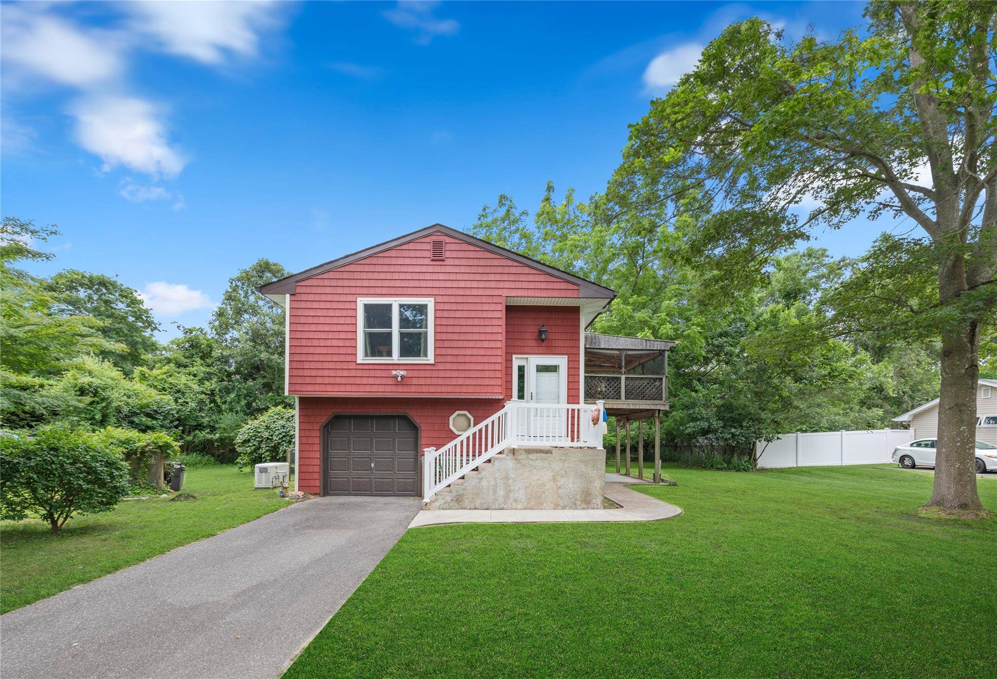 Unlock the potential of this warm and inviting home, located just one block from Bellport Village.