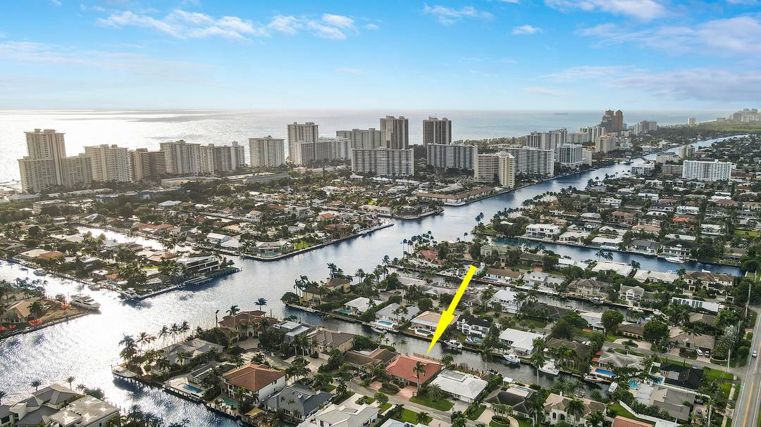 A BOATER'S DREAM ! Sought after Coral Ridge Country Club home on deep water canal, only 4 homes from the Intracoastal Waterway, with no fixed bridges to the Atlantic Ocean.