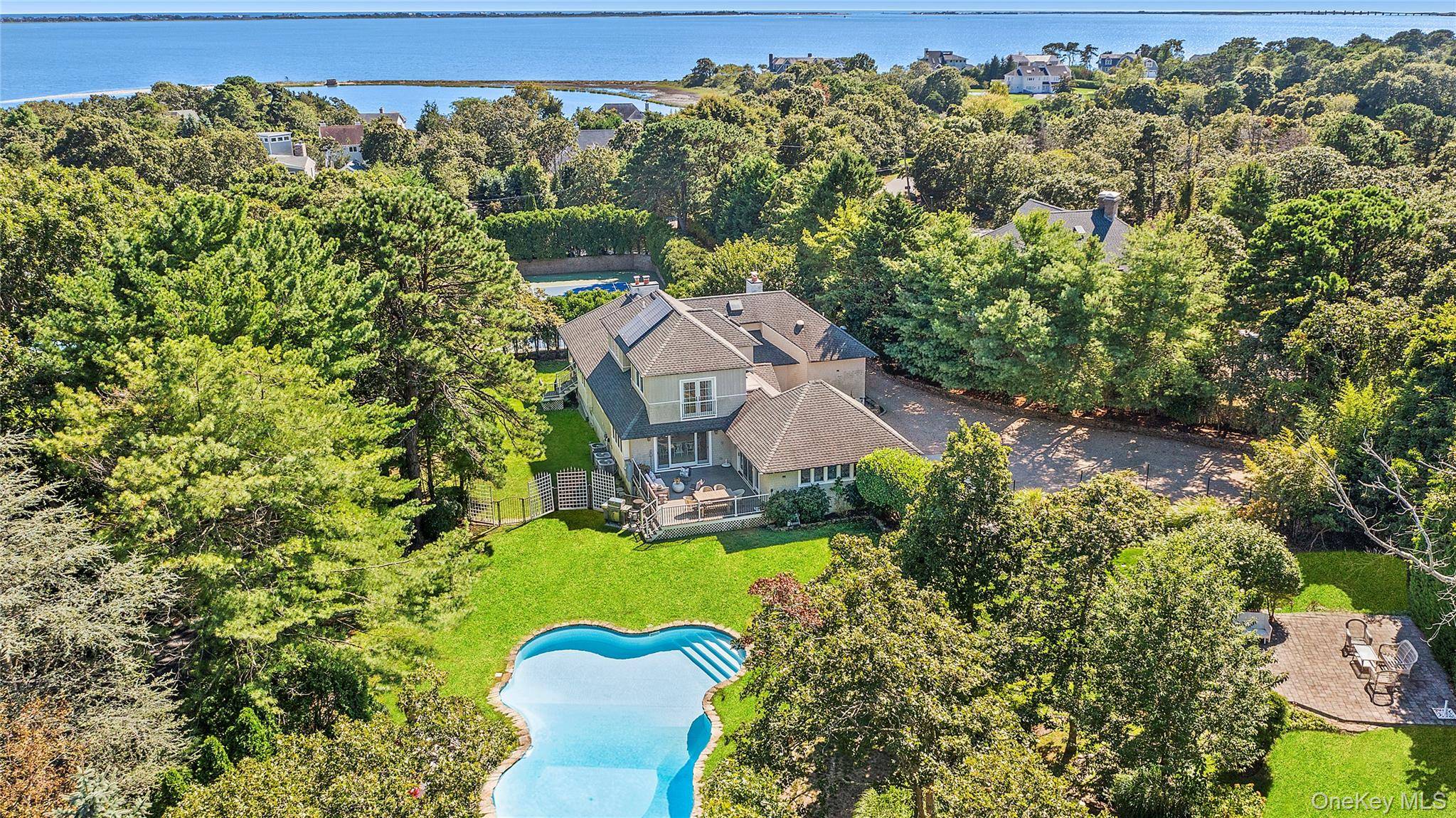 Situated South of the highway, in the prestigious Sandringham Beach community, this recently built and beautifully finished contemporary home has it all !