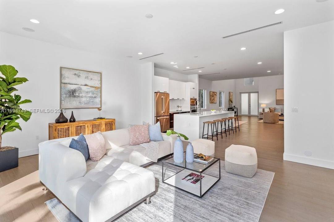 Welcome to this one of a kind contemporary townhome, designed for luxurious living and effortless entertaining.