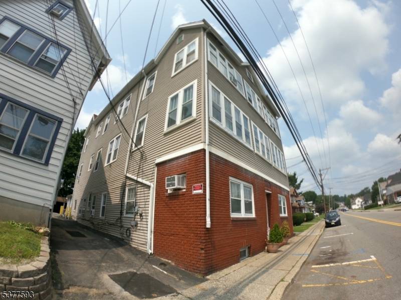 High Income 6 Unit Investment Property with Garages in Downtown Wharton !