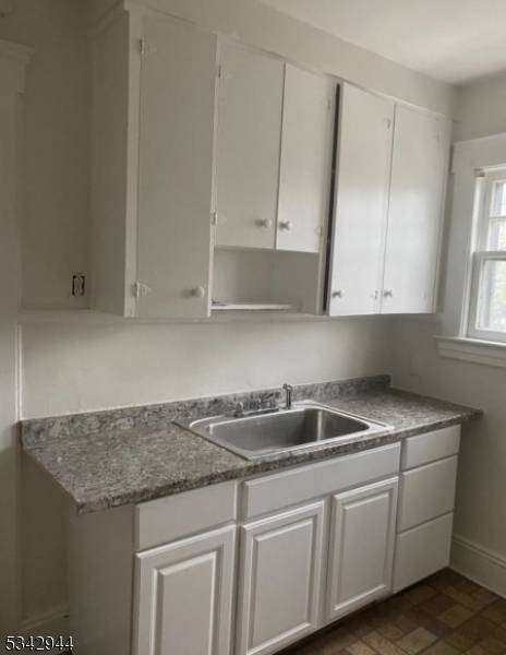 Welcome to this two family home in a highly desirable neighborhood on a tranquil street, just 30 minutes to NYC.