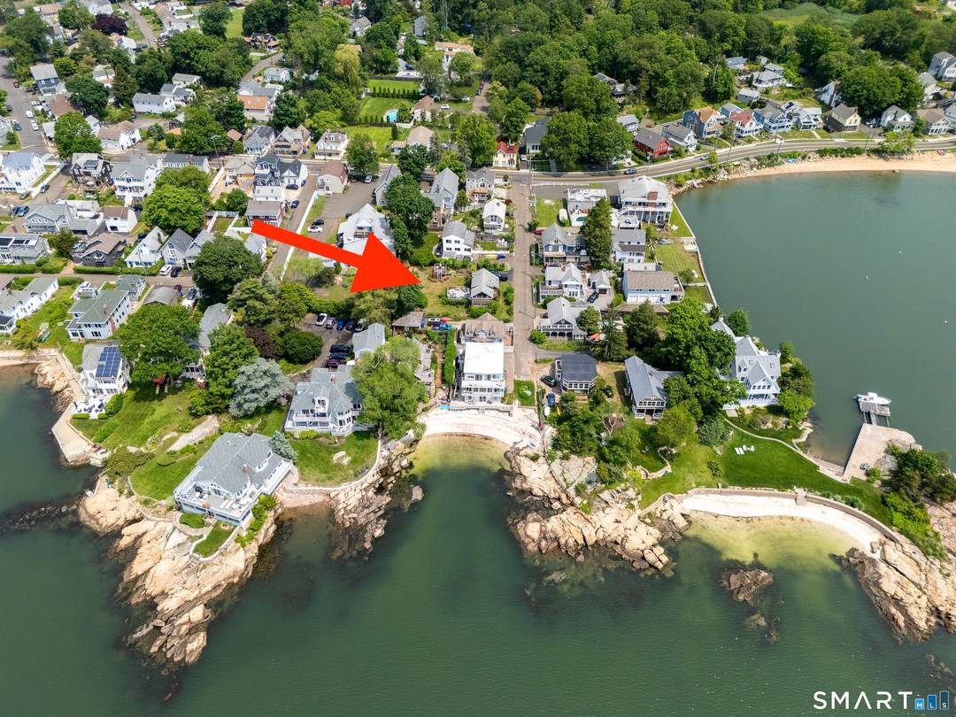 Set on the largest lot on the street in the heart of Short Beach, this cherished coastal home offers a rare blend of history, charm, and future potential.