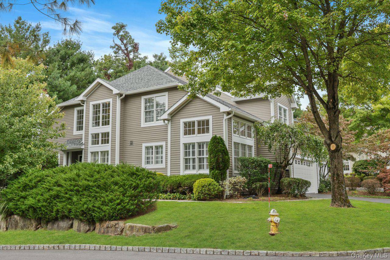 Nestled on a distinguished corner lot within the prestigious gated community of Whippoorwill Hills, this beautifully maintained single family residence offers timeless elegance, modern comfort, and effortless living.
