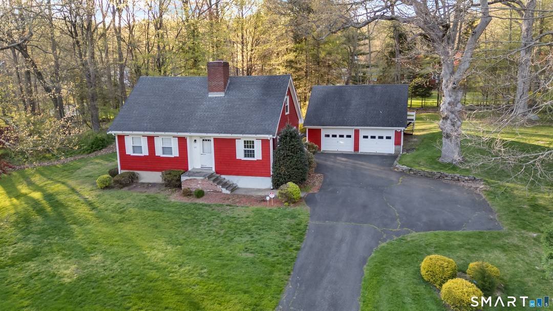 Nestled in the Huntington section of Shelton, this charming one of a kind 3 possibly 4 bedroom Cape Cod offers the perfect blend of privacy, character, and convenience.
