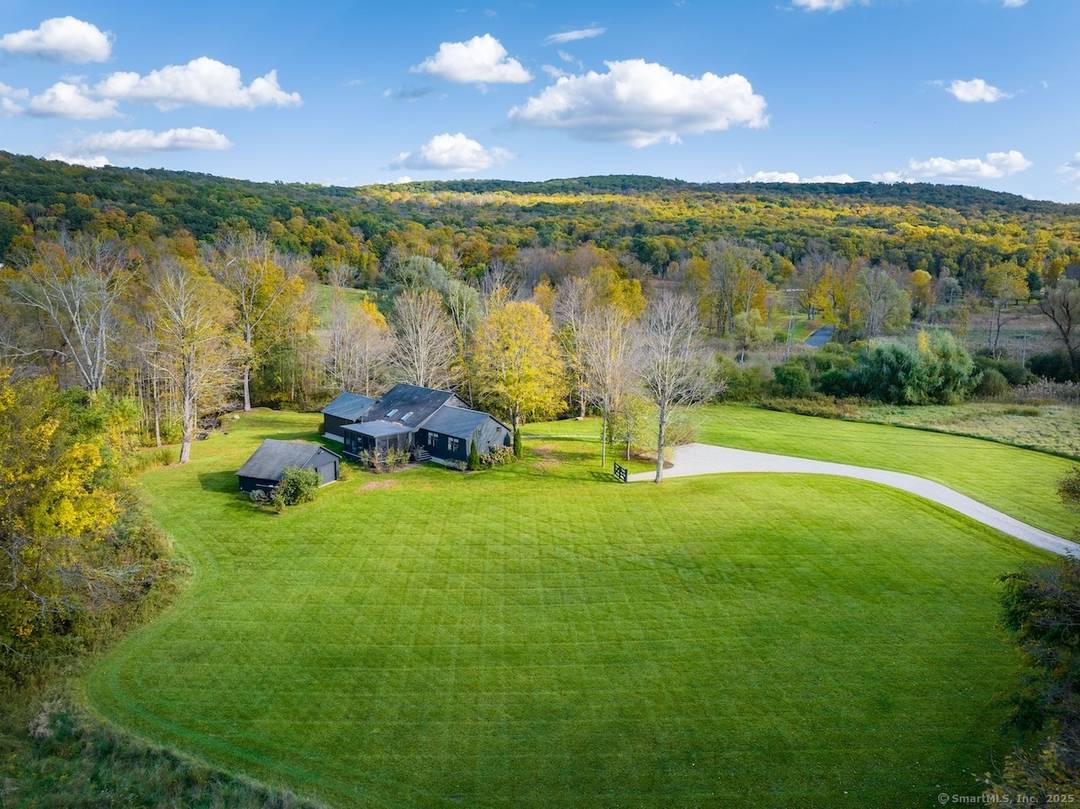 Renovated Sharon Farmhouse with Brook Views Knibloe Hill Road, CT This newly renovated farmhouse graces one of Litchfield County's most coveted addresses, overlooking a peaceful babbling brook in Sharon, Connecticut.