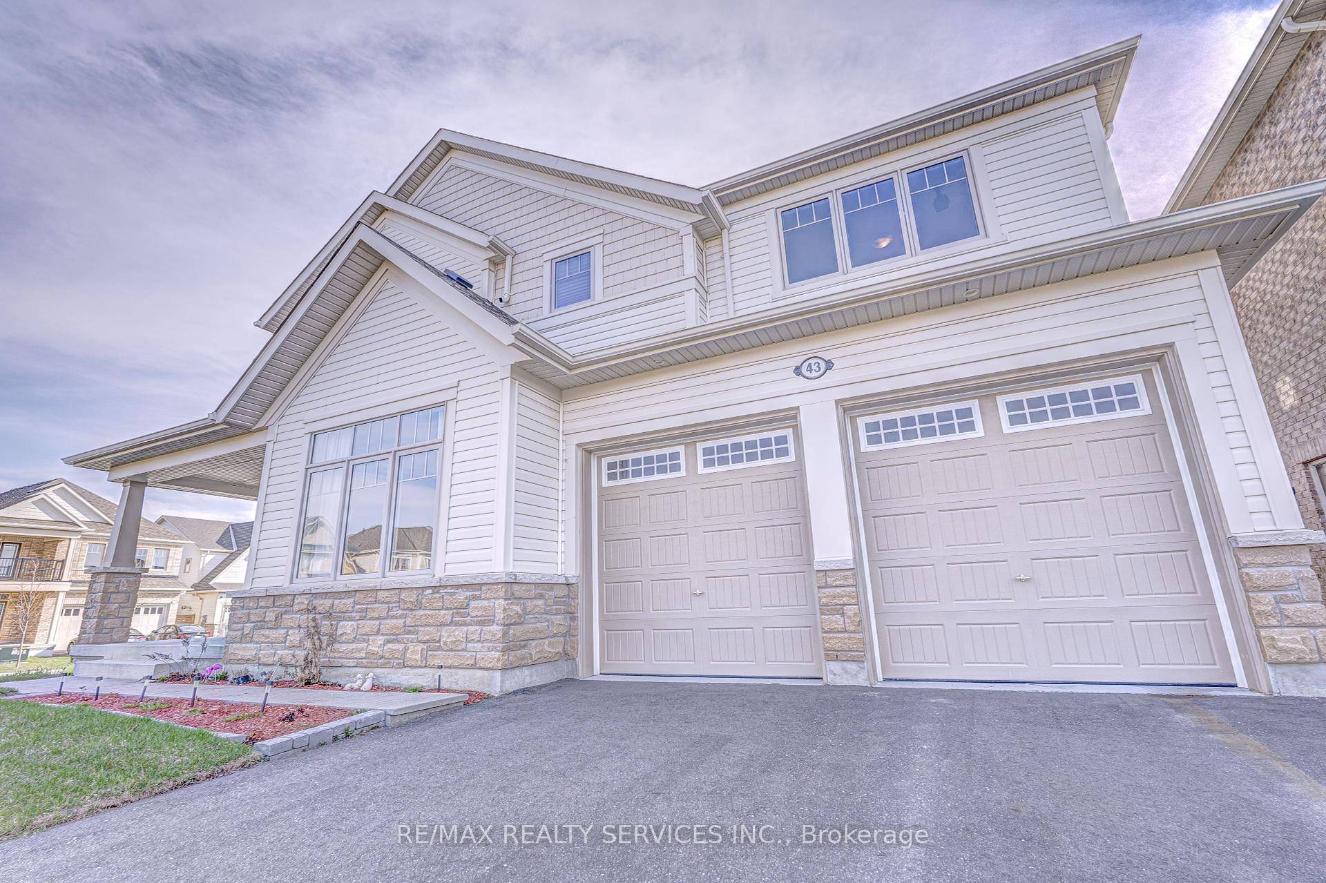 Welcome to 43 Conlin Court, a captivating retreat in the heart of Fergus, nestled on an expansive lot that blends serene country charm with city convenience.