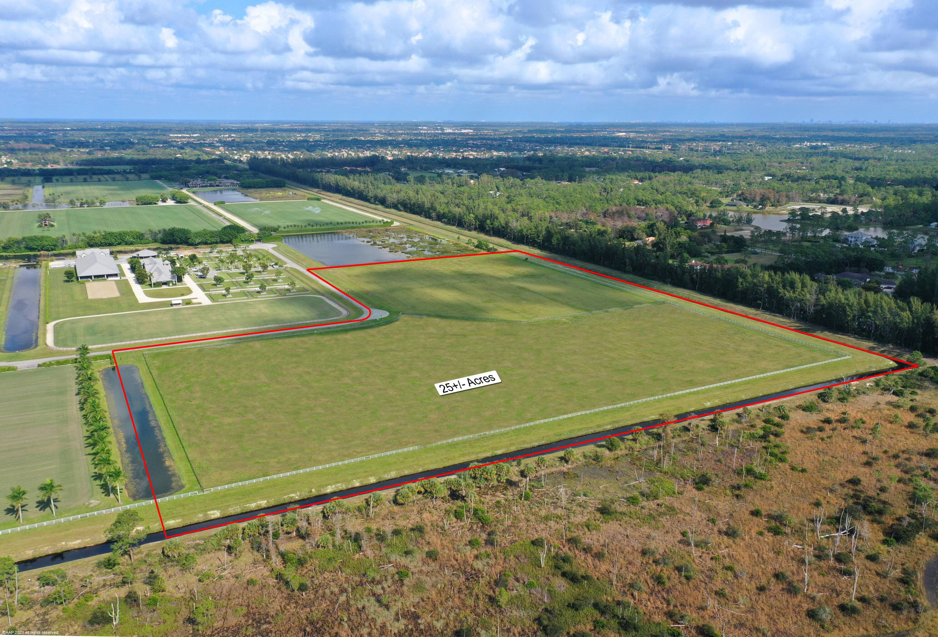 Peaceful 25 Acre oasis in the gated equestrian subdivision of Wellington Preserve.