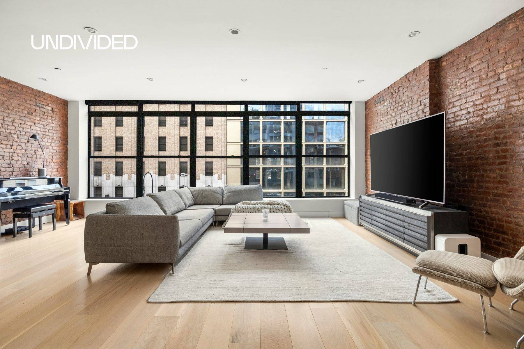Welcome to Loft 4 at 133 West 14th Street, a renovated 2 bedroom, 2 bath condominium spanning approx.