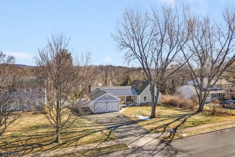 Captivating Expanded Ranch the product of a top to bottom total home renovation completed mid year in 2021 blends striking design, the splendor of abundant natural light, and the beauty ...